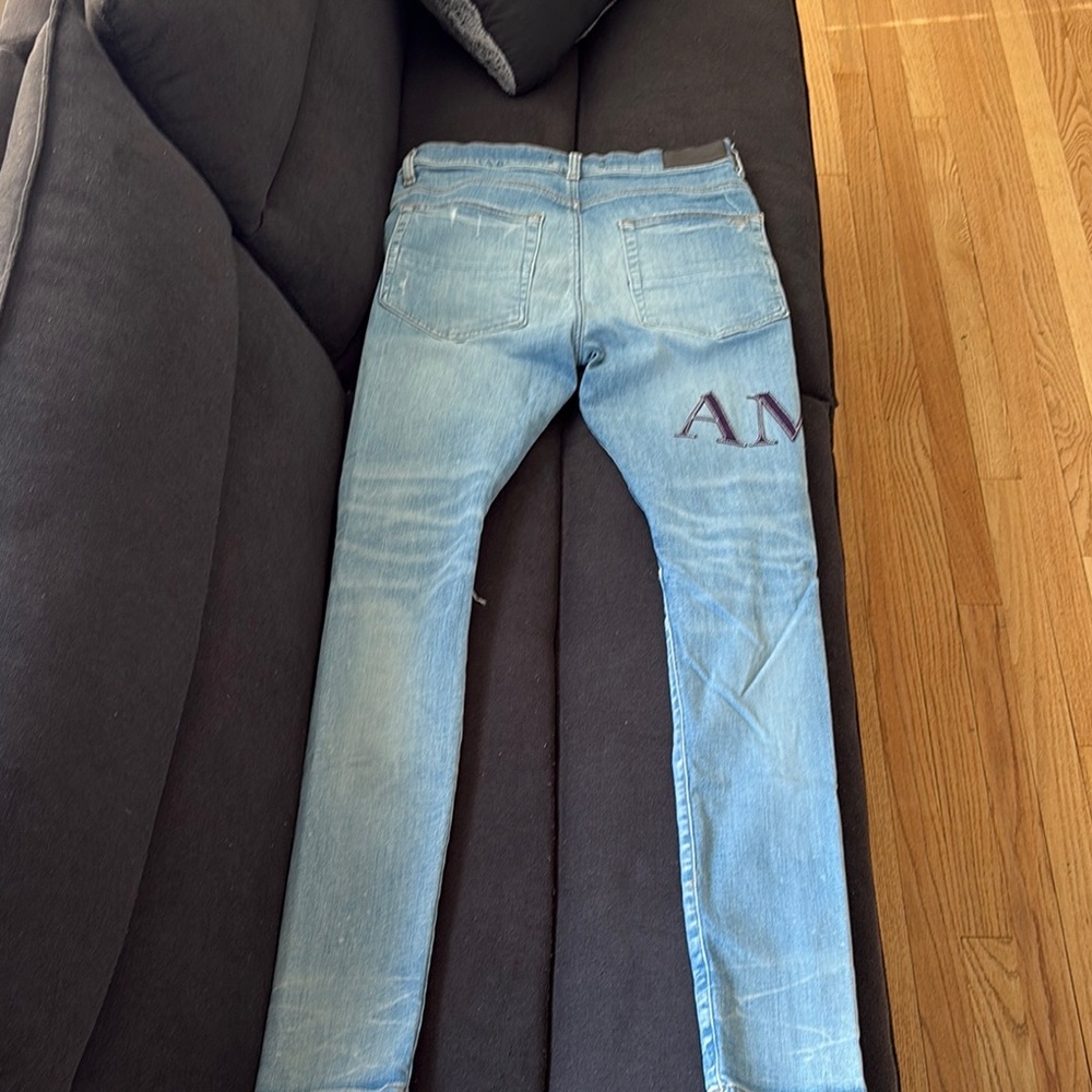 Distressed Light Blue Jeans With Patch - image 6